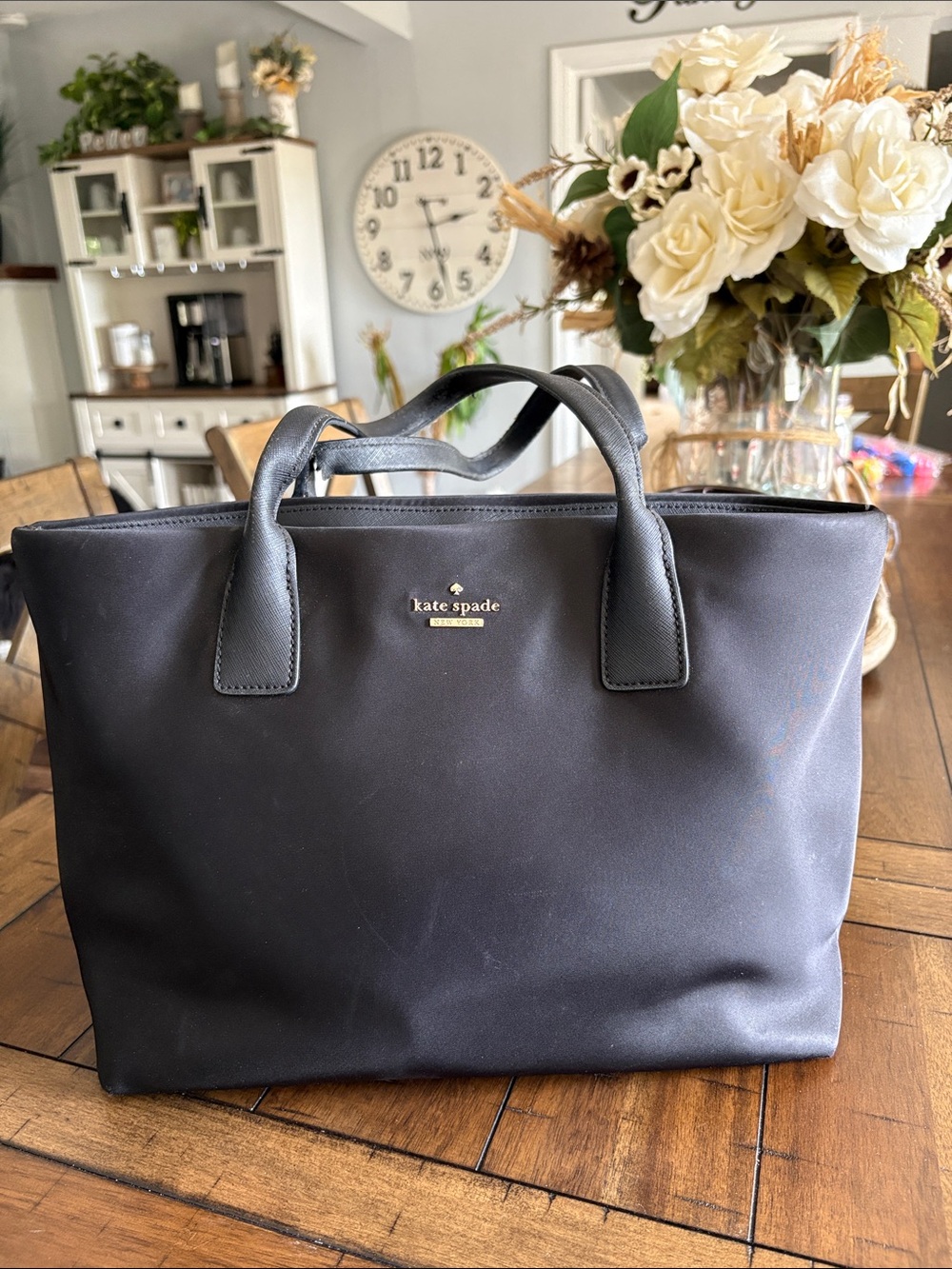 kate spade black tote with gold logo
